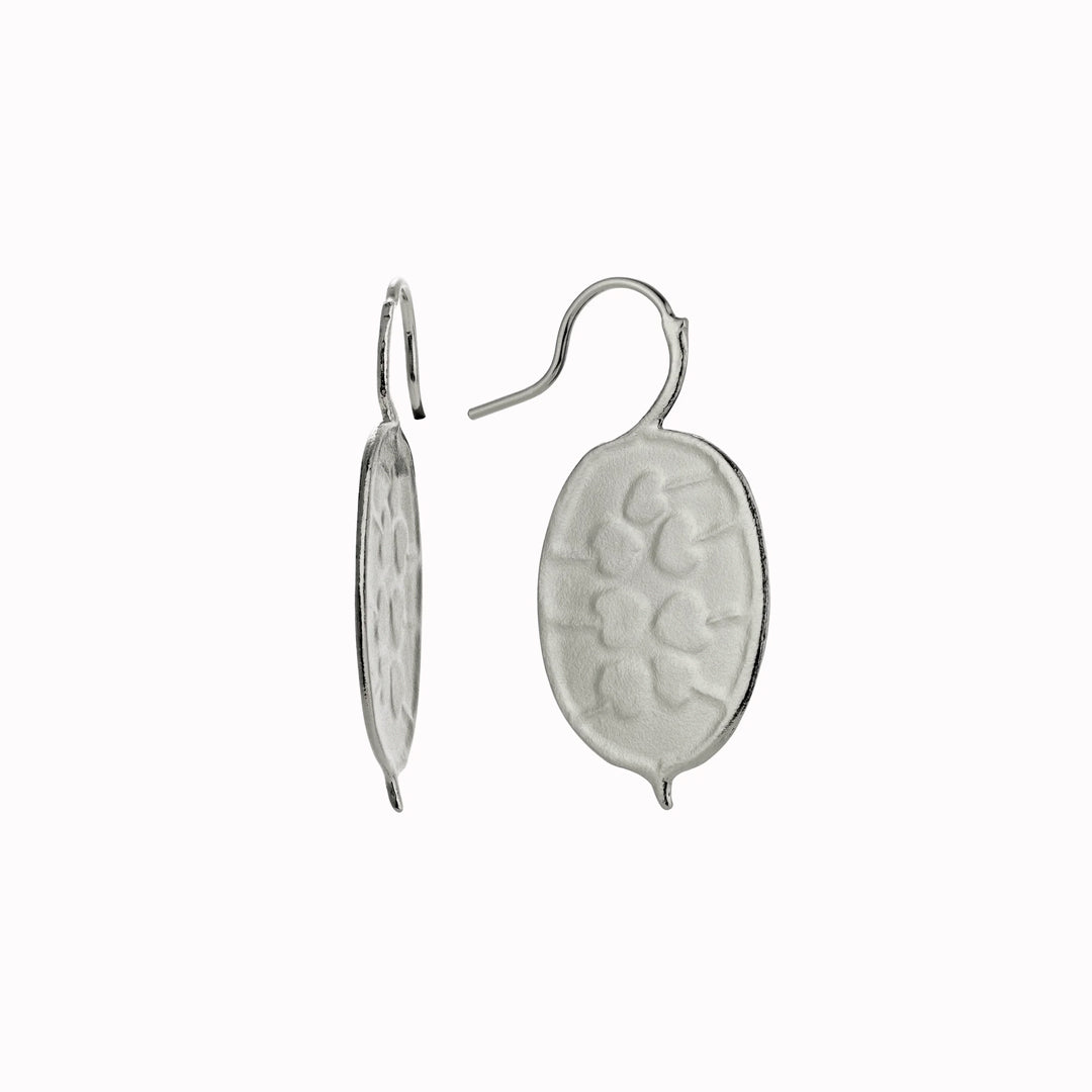 The Honesty Pod hook earrings are inspired by honesty pods (also known as silver dollars) with charming heart shaped seed detail.