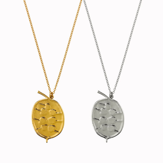The Honesty Pod necklace is a botanical pendant necklace with charming heart shaped seed detail.