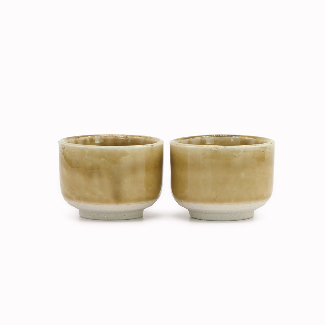 The Chips Inc. Heuge Sake Cups in Ochre yellow is part of a range of Mino pottery using the four colours that have transcended 1000 years of pottery making in Japan. 