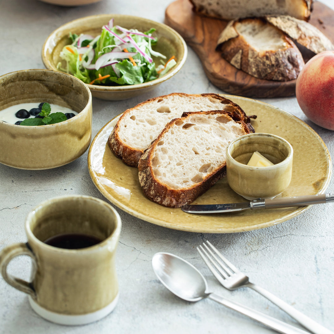 The Chips Inc. Heuge Sake Cups in Ochre yellow is part of a range of Mino pottery using the four colours that have transcended 1000 years of pottery making in Japan. 