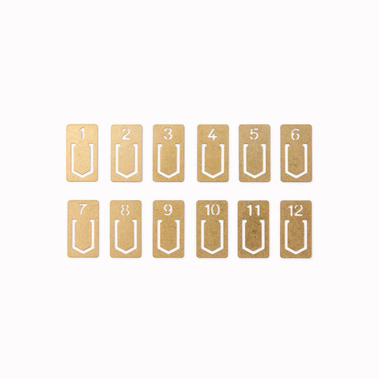 Made from solid brass that develops a warm patina over time, they’re designed to clip onto notebook pages, index cards, folders or documents