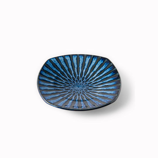 18cm square plate with a pretty indigo blue 'drip' effect glaze to mix and match in with your tableware collection.