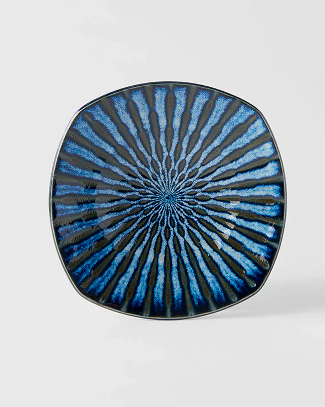 18cm square plate with a pretty indigo blue 'drip' effect glaze to mix and match in with your tableware collection.