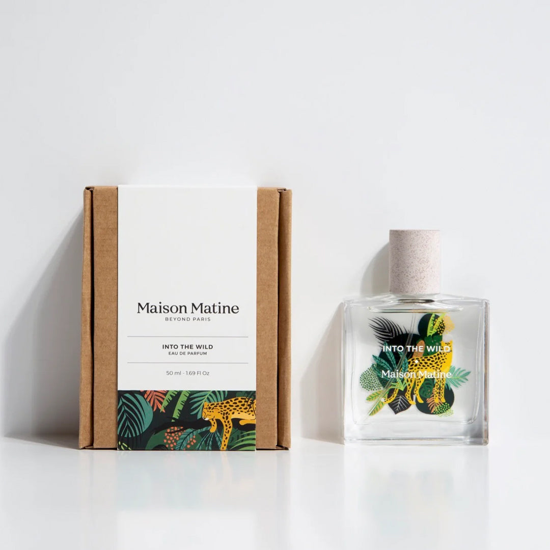 Maison Matine's 'Into the Wild' is a scent inspired by nature, travel and life's adventures, all housed in an illustrative glass bottle. 50ml bottle shown, with leopard and jungle leaves. With box.