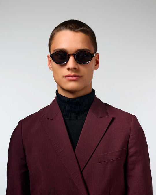 The Jace pushes further into a sharper, more fashion-led silhouette with narrow lenses and defined acetate lines.