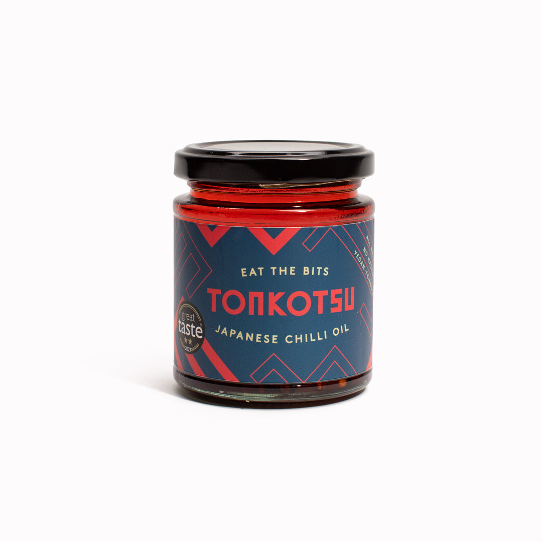 Tongotsu Japanese chilli oil, full of natural umami goodness is a blend of rapeseed oil, d’Arbol chilli flakes and shichimi togarashi (a Japanese spice mix) and is given a further flavour boost with the addition of red miso, garlic, onion, sesame seeds and sesame oil.