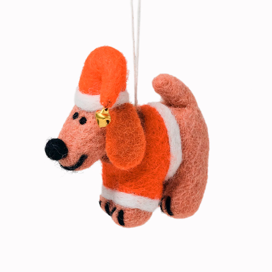 Jeff is ready for Christmas! The most festive dog decoration you will see. A playful felted Christmas tree decoration designed by Cari Vander Yacht.