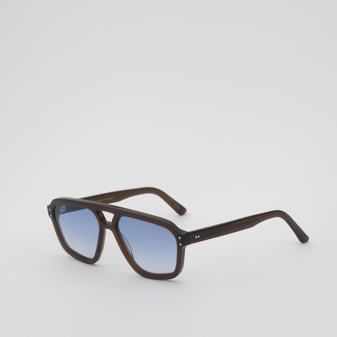 Retro, vintage 1970's style large aviator style black framed sunglasses with a blue gradient lens colour