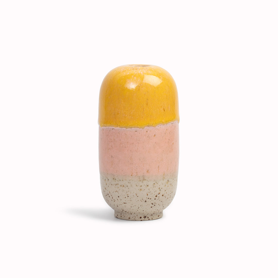 The Juice&nbsp;design is hand-thrown in watertight stoneware. Due to the rounded taper at the top of the vase, the glaze melts down the sides of the cylindrical vase mimicking melting ice.&nbsp;