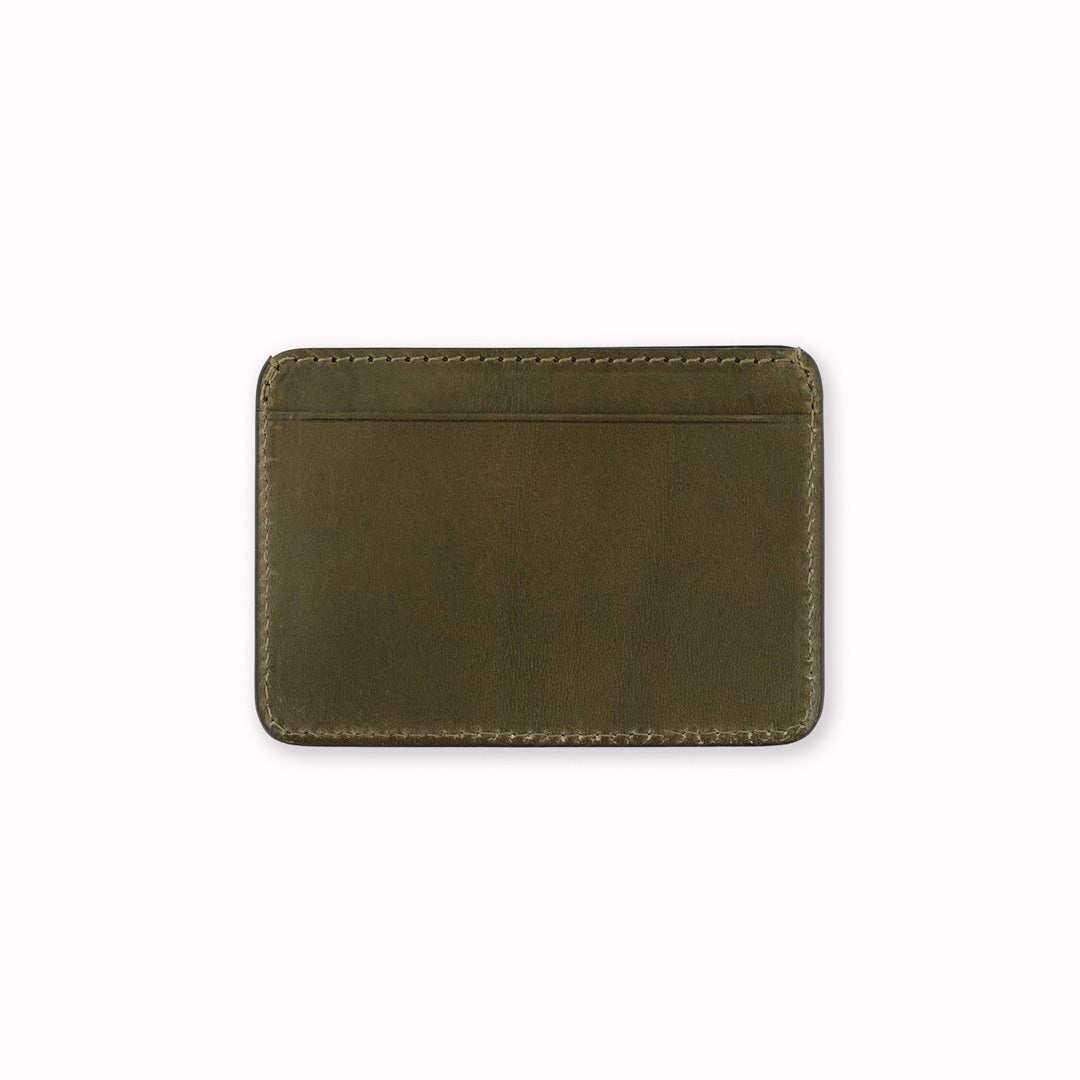 A slim and stylish cardholder from Escuyer, in Khaki green leather. The cardholder is handmade by Portuguese artisans, using vegetable-tanned leather from a tannery in Tuscany, Italy.