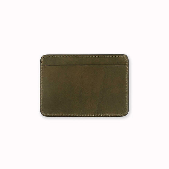 A slim and stylish cardholder from Escuyer, in Khaki green leather. The cardholder is handmade by Portuguese artisans, using vegetable-tanned leather from a tannery in Tuscany, Italy.