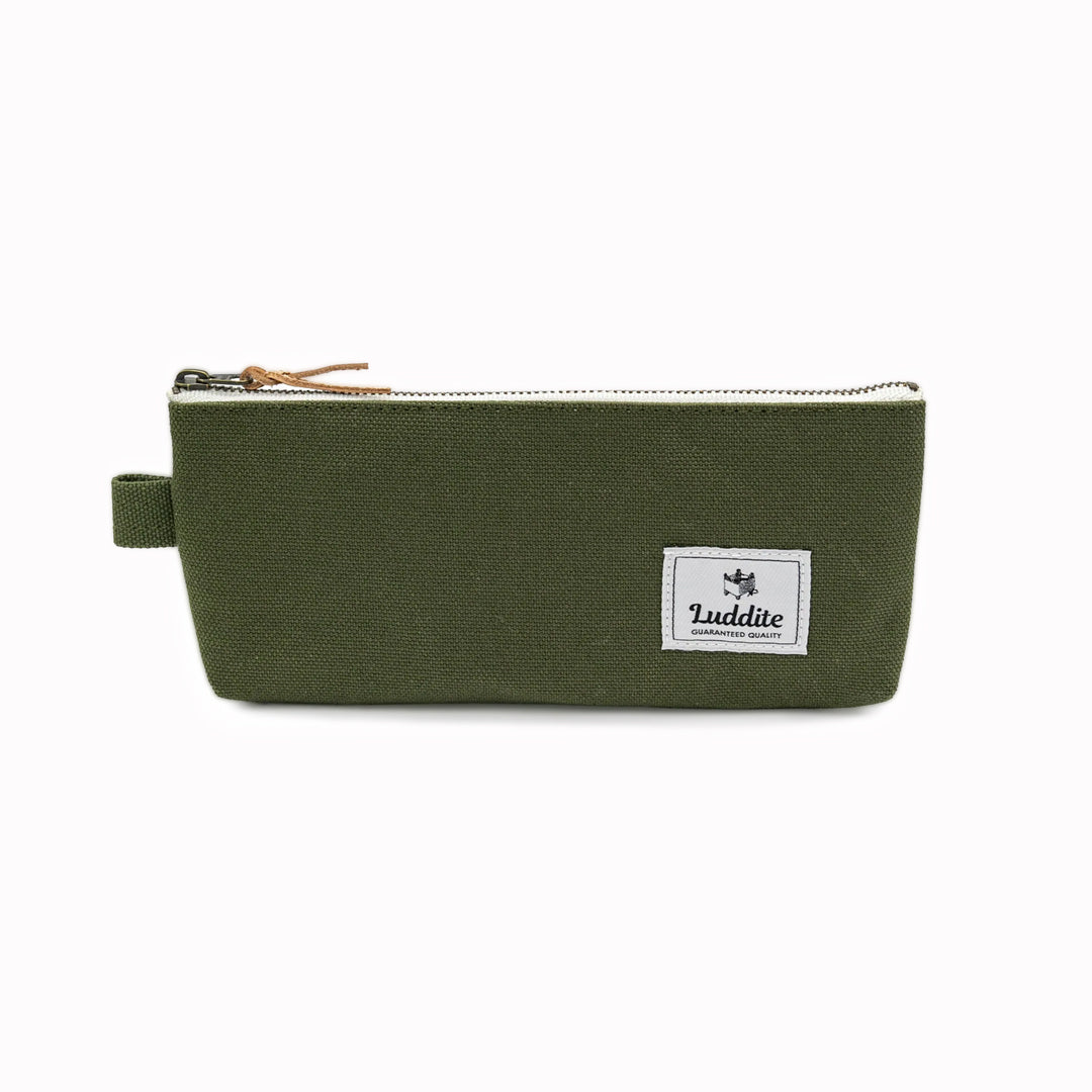 Flat pouch style pen and pencil case by Japanese stationery brand Luddite. the durable and tactile pencil case features a zipper along the length of the pencil case allows easy access to the items inside.