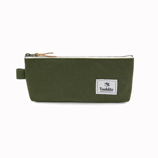 Flat pouch style pen and pencil case by Japanese stationery brand Luddite. the durable and tactile pencil case features a zipper along the length of the pencil case allows easy access to the items inside.