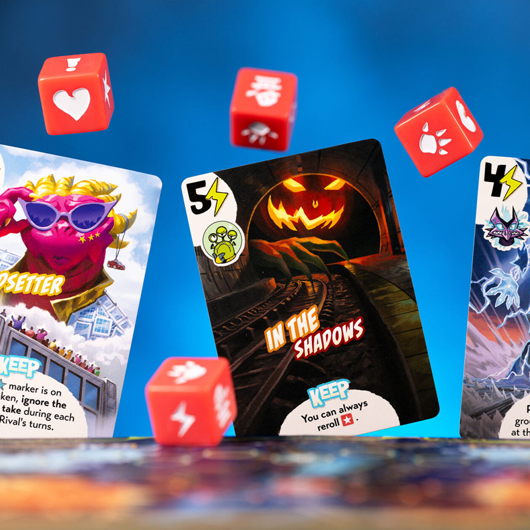 The original King of Tokyo game is something of a classic. Kind of an attack based Yahtzee where players get to play a giant monster that attacks both the city and each other with dice and power cards determining the outcome.