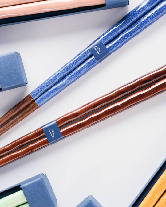 The chopsticks are gently shaped and textured which sits well alongside ceramic glazed tableware and is also easy to grip. Presented in a simple box for gifting.