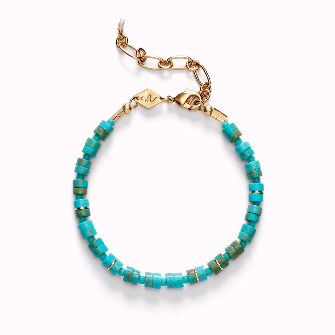 The Lagoon Bracelet by Anni Lu is a stunning piece crafted in brass with 18-karat gold plating and e-coating.