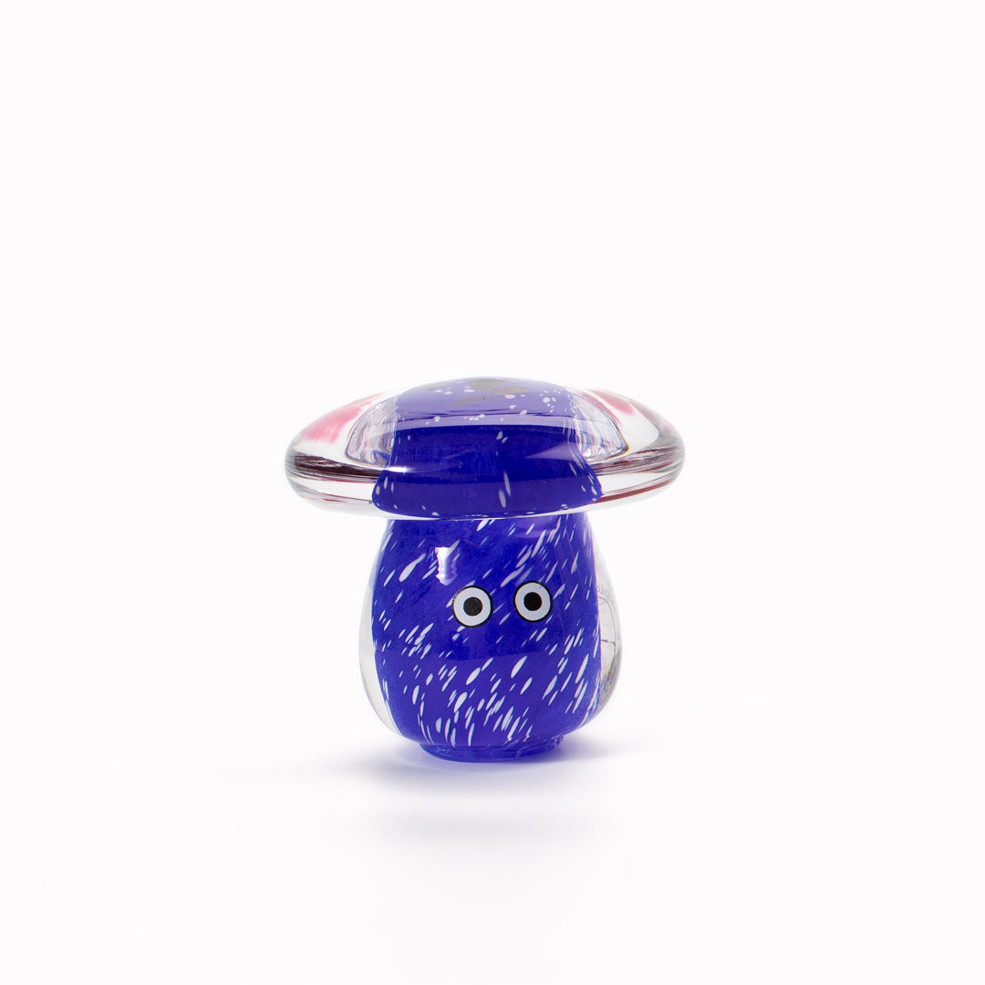 Shroom Crystal Blob is formed by dipping and/or rolling molten (hot!) clear glass into smaller chunks of brightly coloured glass droplets, then expertly shaping into weird and wonderful forms.