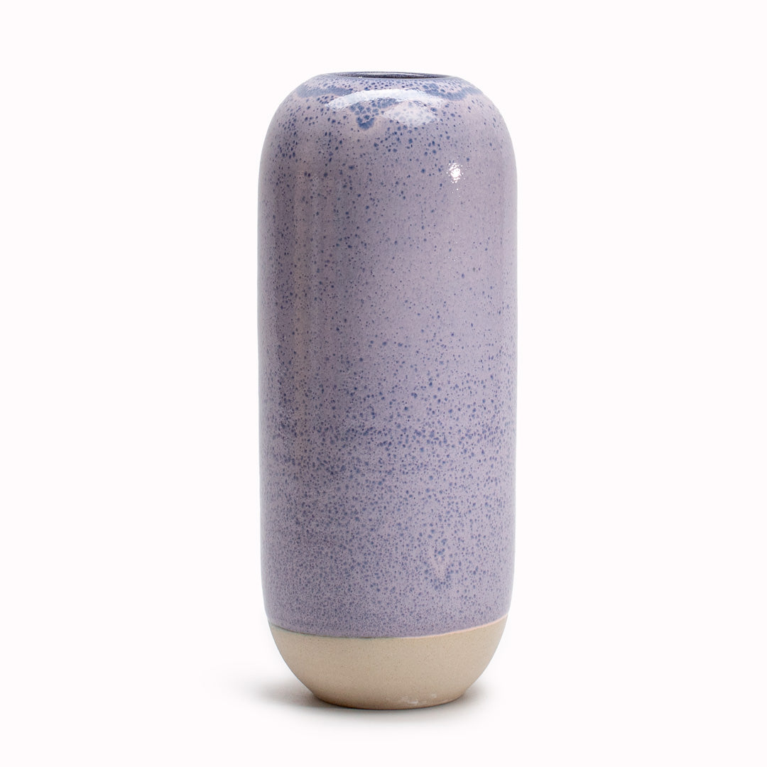 Studio Arhoj's Japanese inspired vases are named after the Japanese word for snow. The pale blue speckled hued Lake Shoji design is hand-thrown in watertight stoneware.