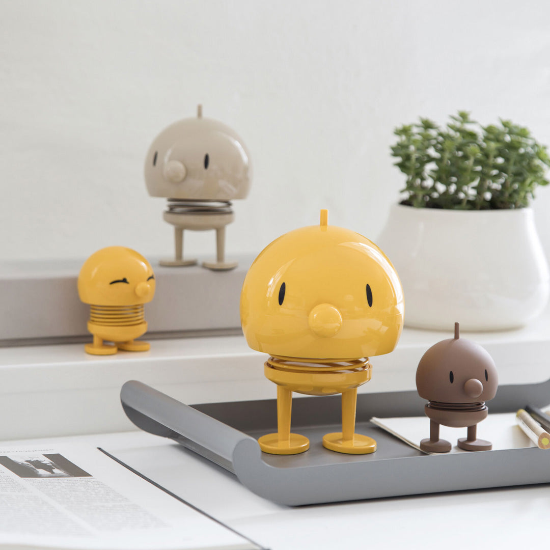 Springy and cheerful! Bumble by Hoptomist is the classic 1960's home decor, happy ornamental figurine in a bright and sunny yellow colour. Lifestyle