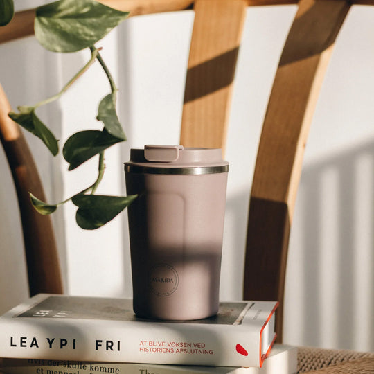 Insulated reusable coffee and hot drinks cup by Danish brand Aya&amp;Ida. Their CUP2GO is functional, beautiful, and a sustainable alternative to single-use cups with plastic lids