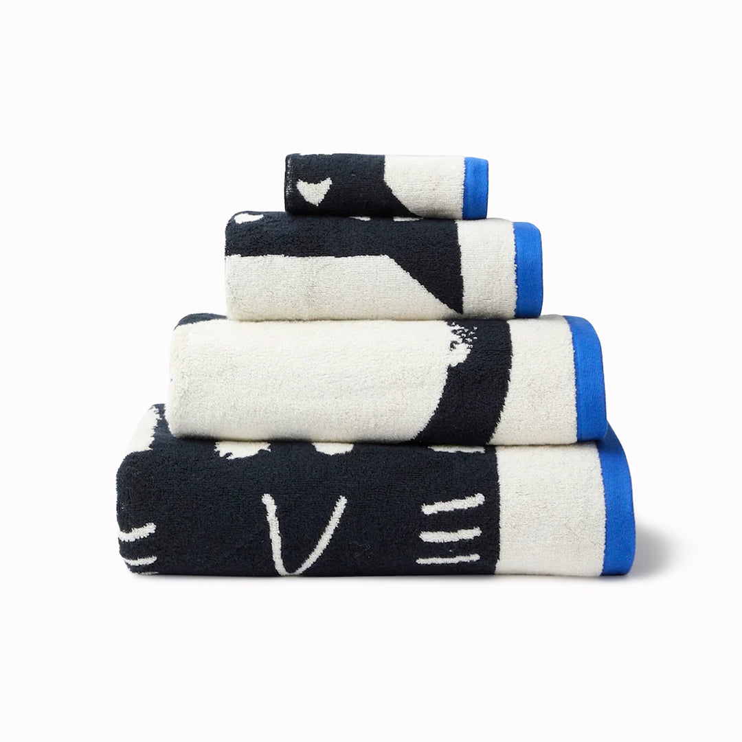 The Donna Wilson Lazy Cat Hand Towel brings a playful, design-led twist to everyday linen