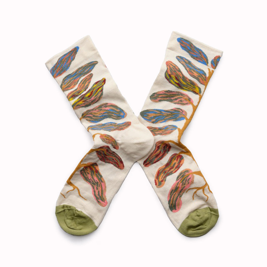 This Leaves Natural pair of mid-calf length socks is from the Le Poète collection