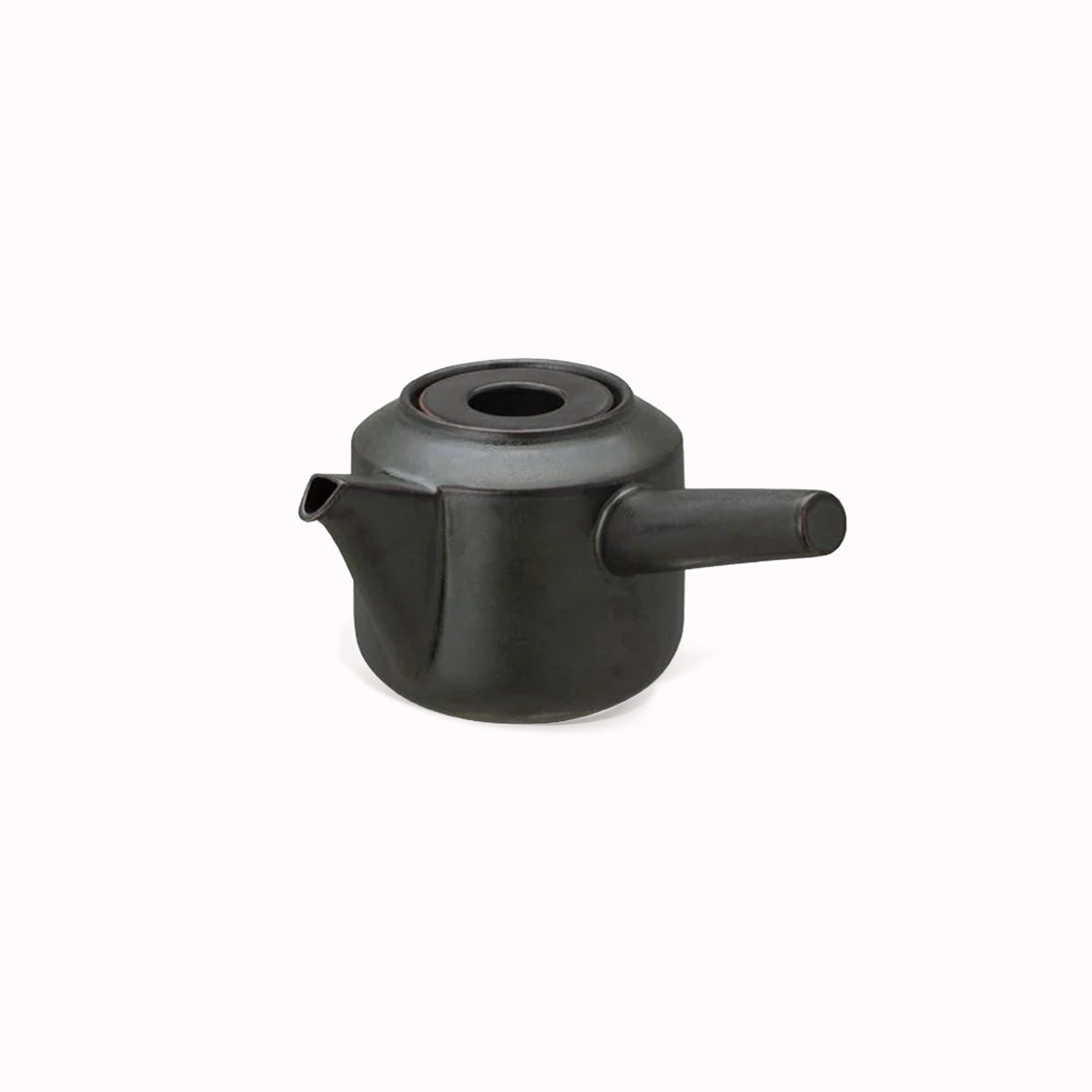 The Leaves to Tea teapot from Kinto is made of black porcelain, and features a sleek design that blends well with any tableware. The teapot has a large side handle that is easy to grip and a spout that pours smoothly.  It holds 300ml and is perfect for making a single cup of tea.