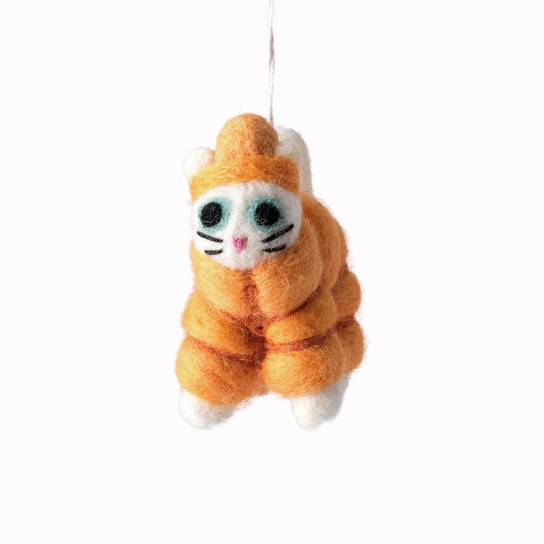 Lee, Cat in an orange puffa jacket. A playful felted Christmas tree decoration designed by Elliot Kruszynski.