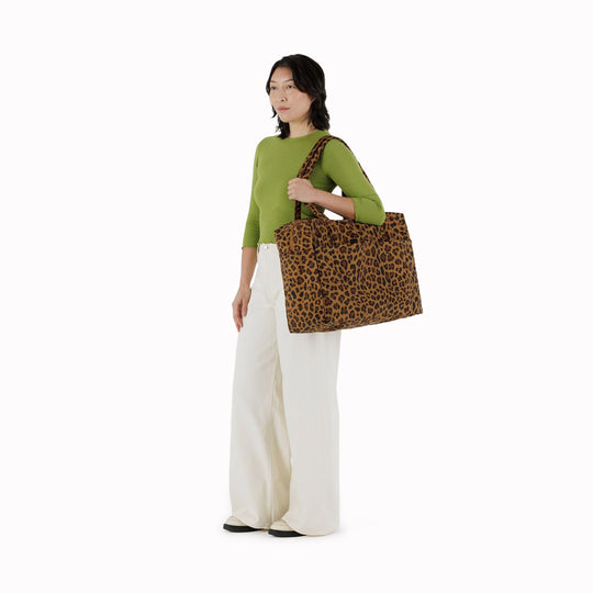 Large Cloud Carry-On in Leopard from Baggu, an impeccably crafted travel essential designed for discerning travelers.