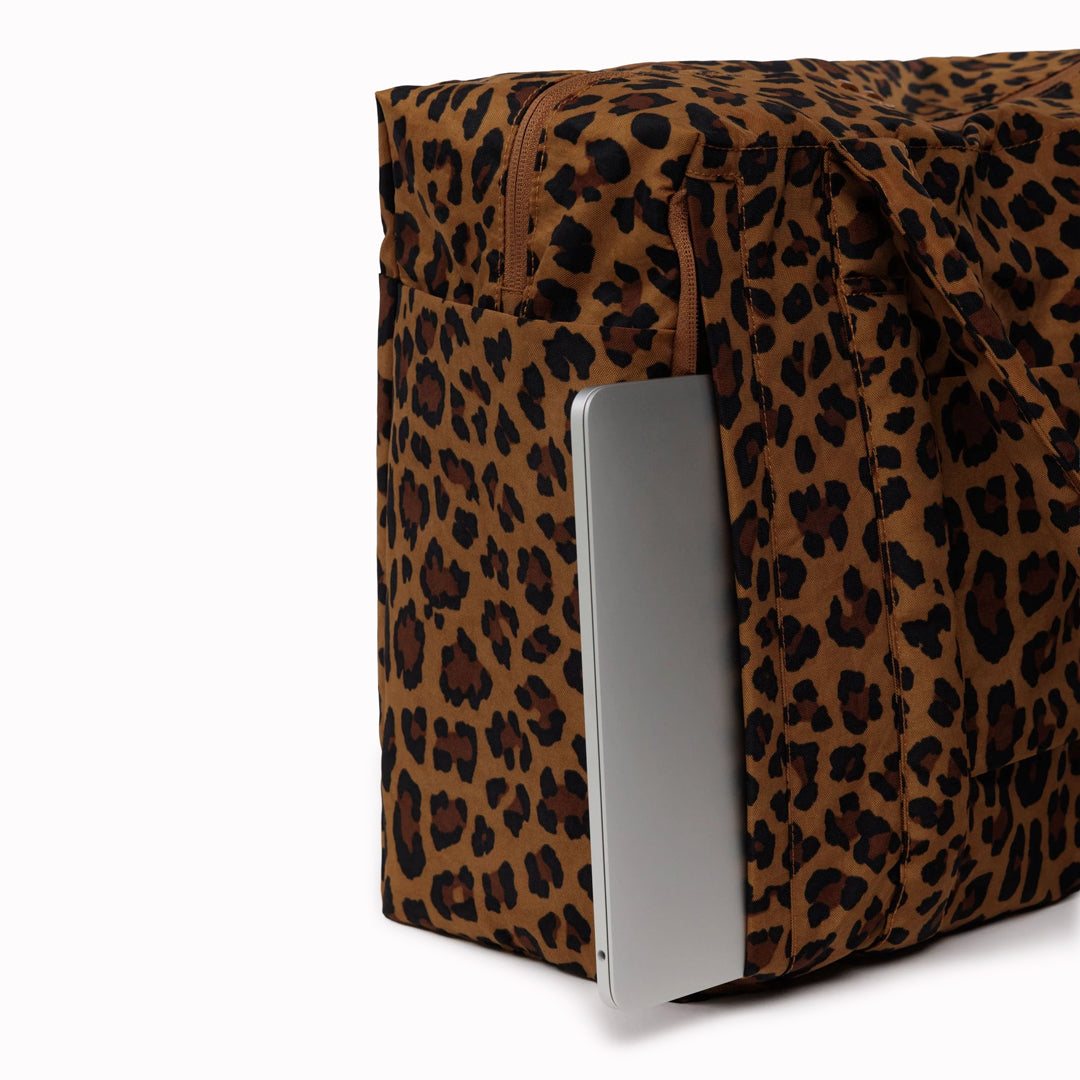 Small Cloud Carry-On in Wisteria from Baggu, an impeccably crafted travel essential designed for discerning travelers.