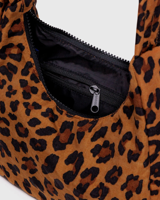 A compact version of BAGGU's signature shoulder bag, finished in Leopard Print. The softly structured shape sits neatly under the arm