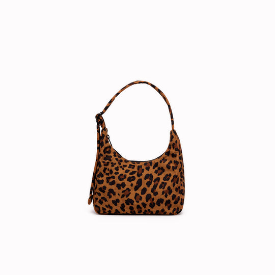 A compact version of BAGGU's signature shoulder bag, finished in Leopard Print. The softly structured shape sits neatly under the arm