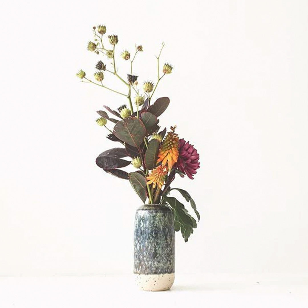 The Yuki Vase by Studio Arhoj is a compact ceramic vase designed for small/medium floral arrangements. Part of the studio’s Edo Series, it reflects a more sculptural side of the Copenhagen workshop’s ceramics