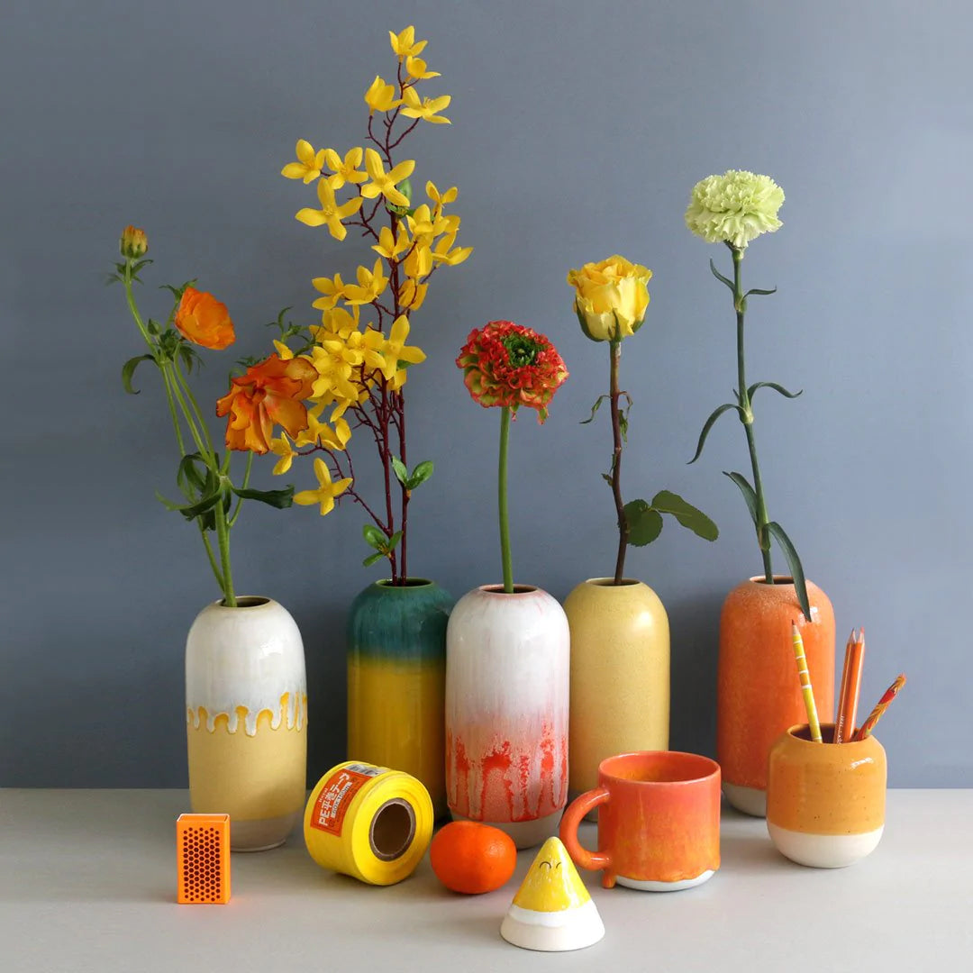 The Yuki Vase by Studio Arhoj is a compact ceramic vase designed for small/medium floral arrangements. Part of the studio’s Edo Series, it reflects a more sculptural side of the Copenhagen workshop’s ceramics