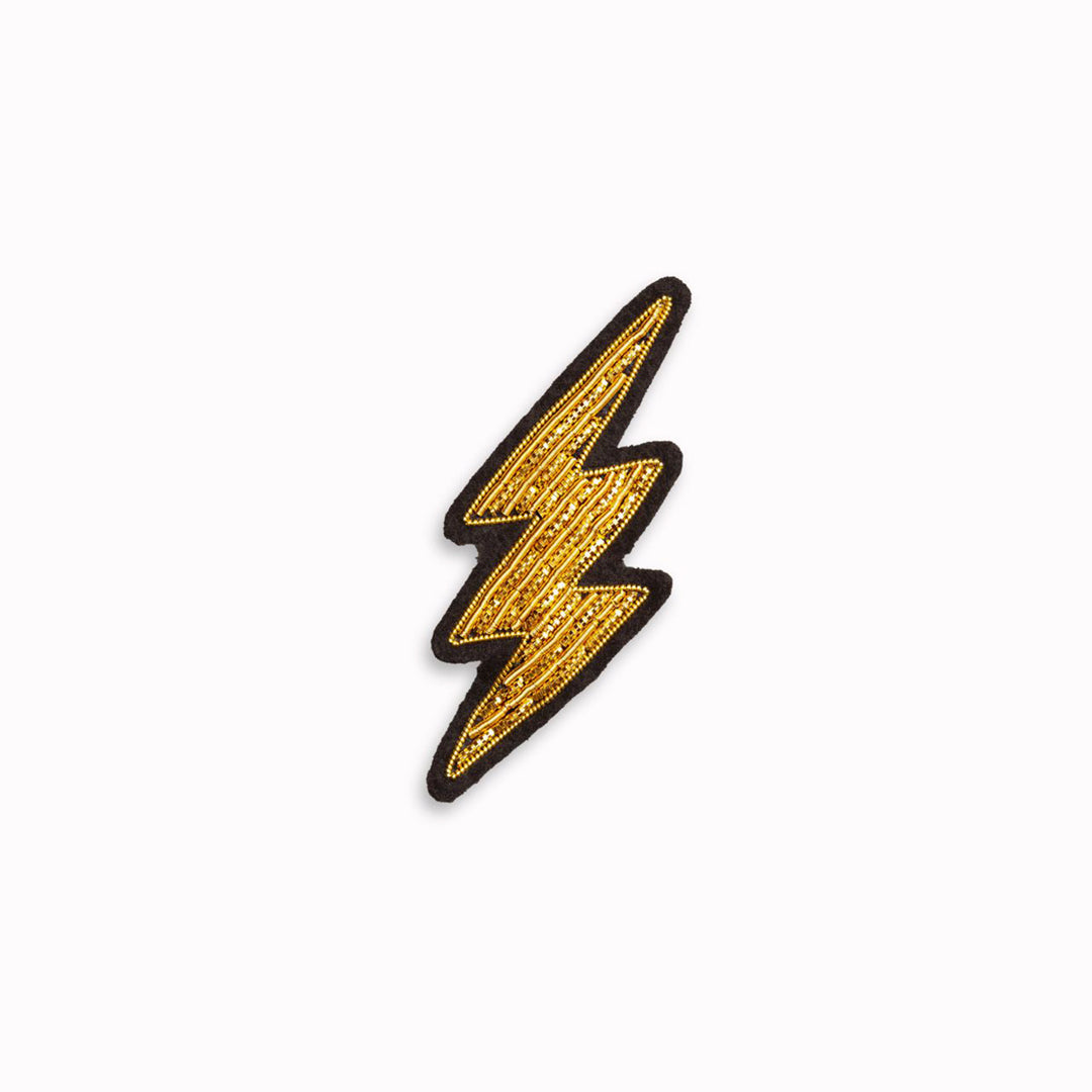 Make a statement with this beautiful gold lightning bolt hand embroidered decorative lapel pin by Paris based Macon et Lesquoy