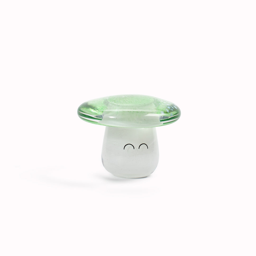 Shroom Crystal Blob is formed by dipping and/or rolling molten (hot!) clear glass into smaller chunks of brightly coloured glass droplets, then expertly shaping into weird and wonderful forms.