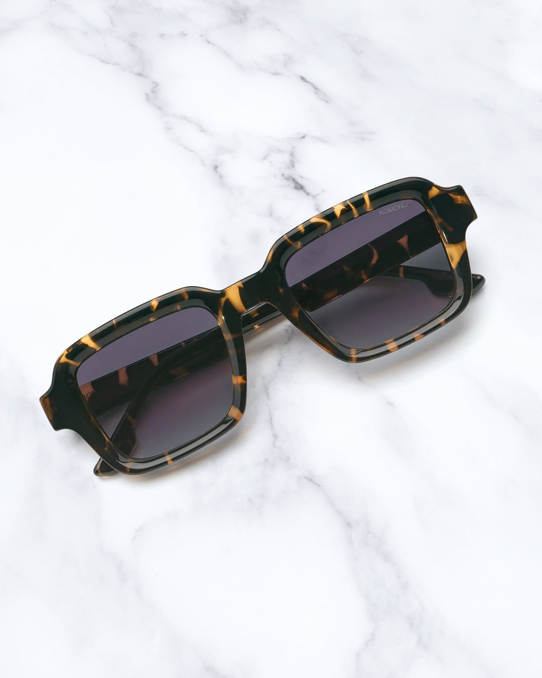 The Lionel takes a broader square frame and pares it back with clean acetate construction and restrained detailing.