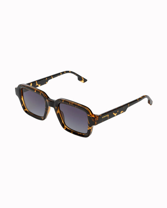 The Lionel takes a broader square frame and pares it back with clean acetate construction and restrained detailing.