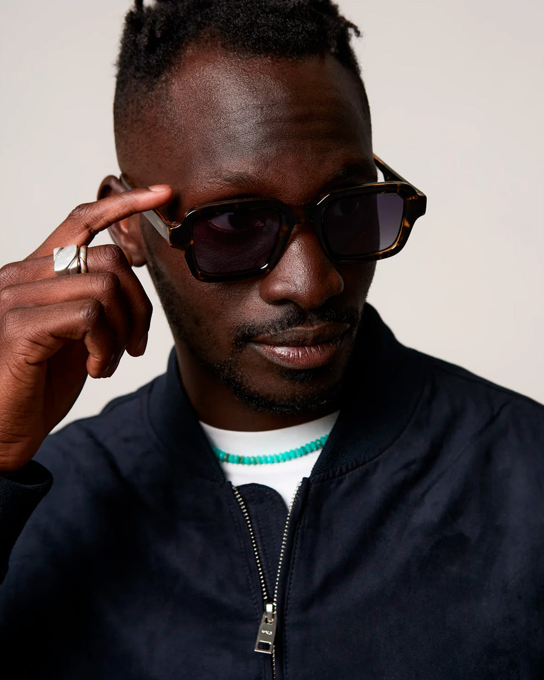 The Lionel takes a broader square frame and pares it back with clean acetate construction and restrained detailing.