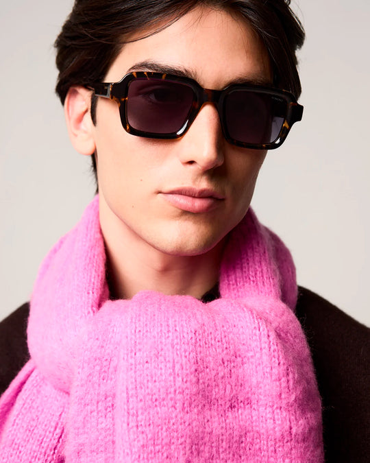 The Lionel takes a broader square frame and pares it back with clean acetate construction and restrained detailing.