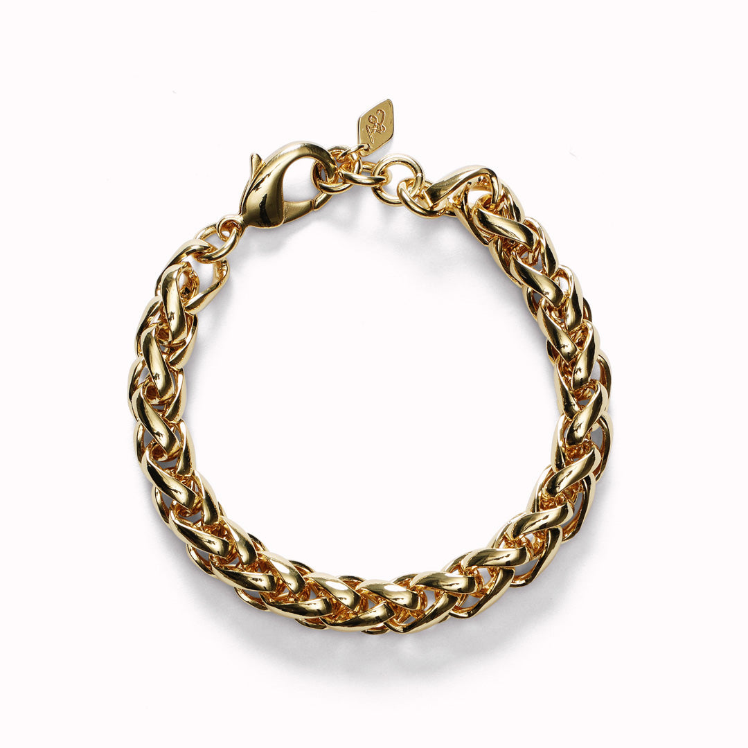 The Liquid Gold Bracelet by Anni Lu matches the chunky decadence of the Liquid Gold Necklace offering timeless sophistication with its elegant gold-plated design.