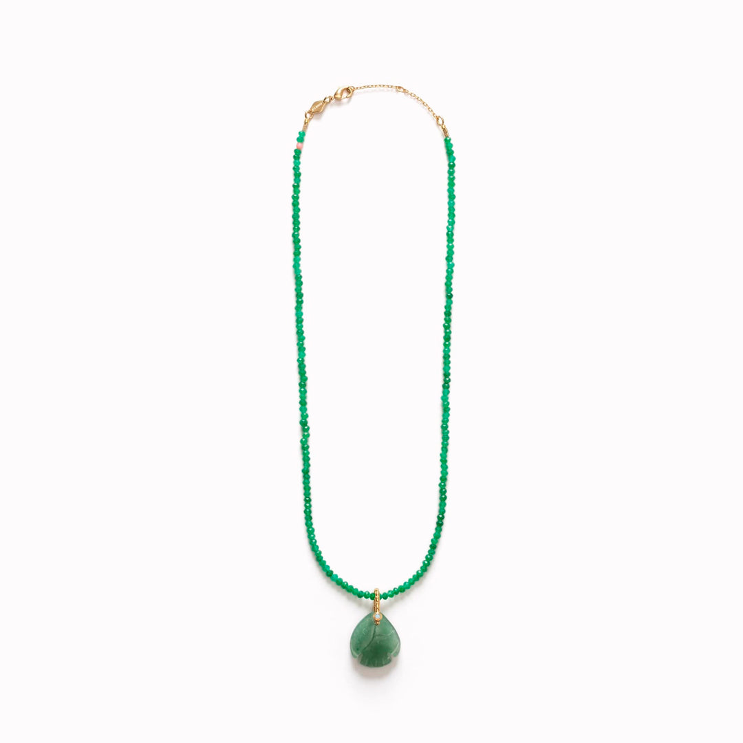 LITTLE SWIMMER floats quietly on the collarbone — a carved jade figure balancing art, story and calm confidence.