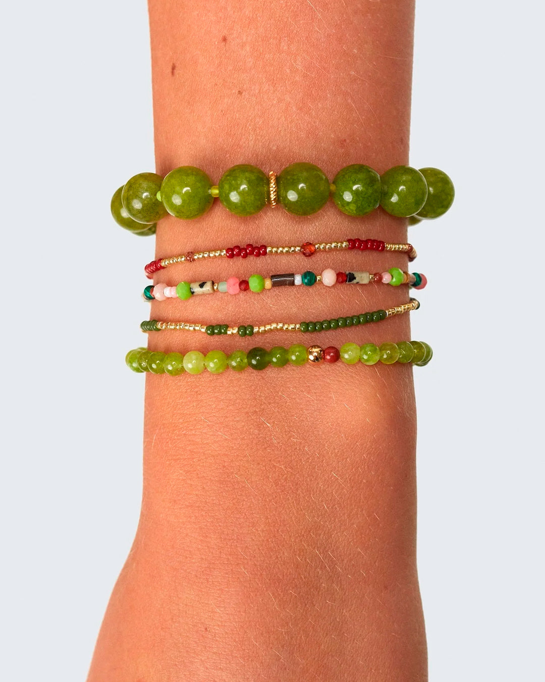 Little Treasure is a fine beaded bracelet combining colourful glass beads with small gold-plated details