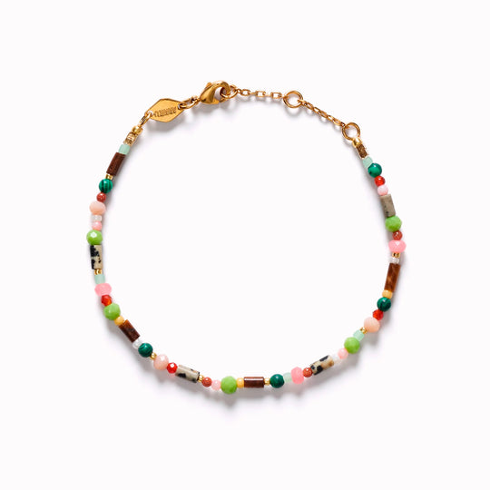 Little Treasure is a fine beaded bracelet combining colourful glass beads with small gold-plated details