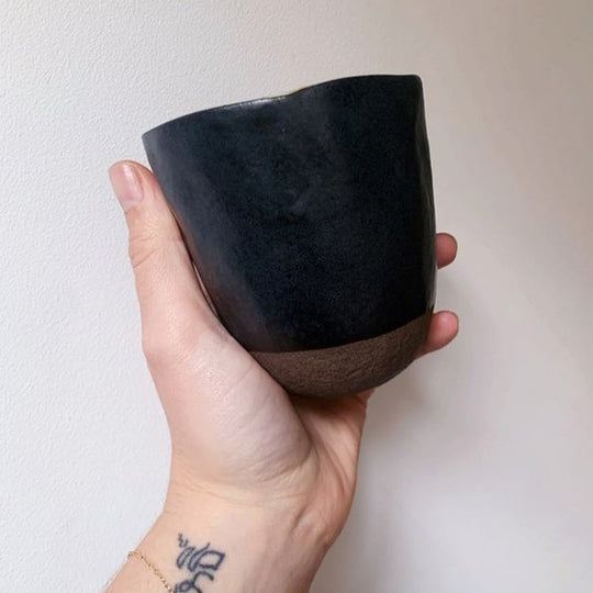 As Held, The Black Bisque Lopsided Tea-mug from Made in Japan is 7cm high and 200ml capacity.