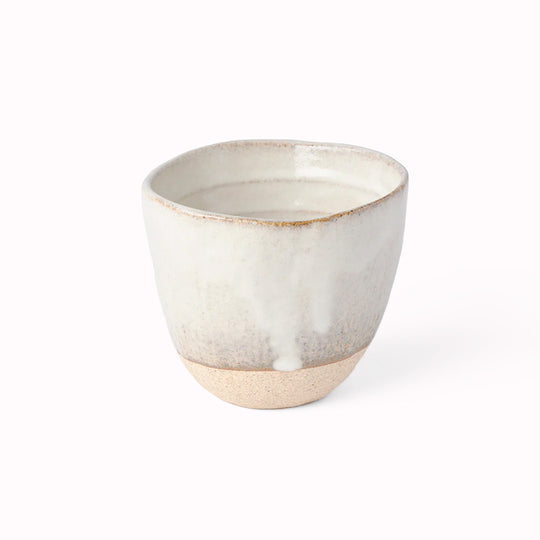 The Fawn Glazed Lopsided Cup on a bisque ceramic base is Made in Japan and holds approx 200ml. 