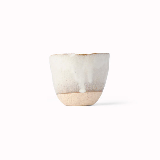 The Fawn Glazed Lopsided Cup on a bisque ceramic base is Made in Japan and holds approx 200ml. 