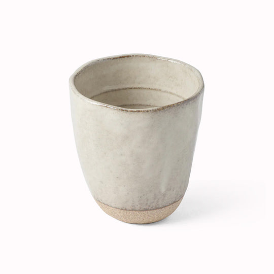 The Fawn Glazed Lopsided Tea mug on a bisque ceramic base is Made in Japan and holds approx 275ml.