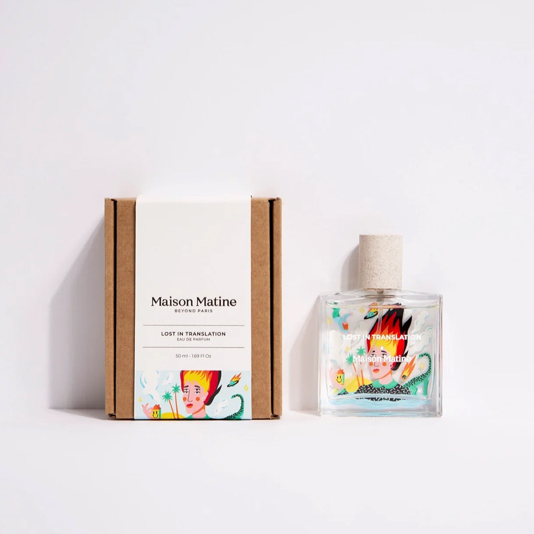 Maison Matine's 'Lost in Translation' is a scent inspired by the idea of living life to the full, this being the first day of the rest of your life, all housed in an illustrative glass bottle. 50ml glass bottle with flaming haired head shown. With box.