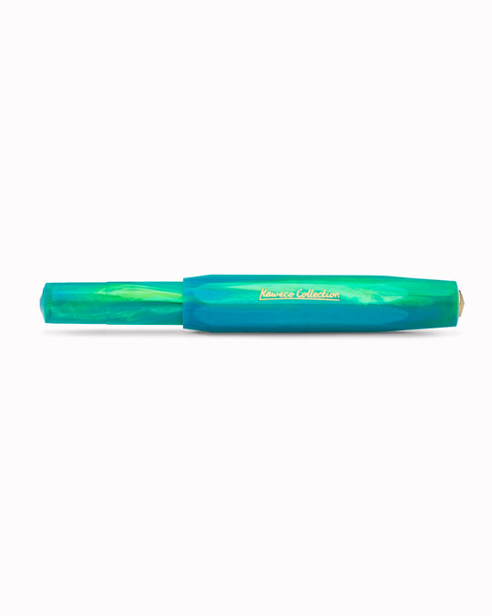 The Kaweco COLLECTION Fountain Pen in Marble Ocean combines deep blue and green tones in a marbled finish, with each pen carrying a slightly different pattern. 